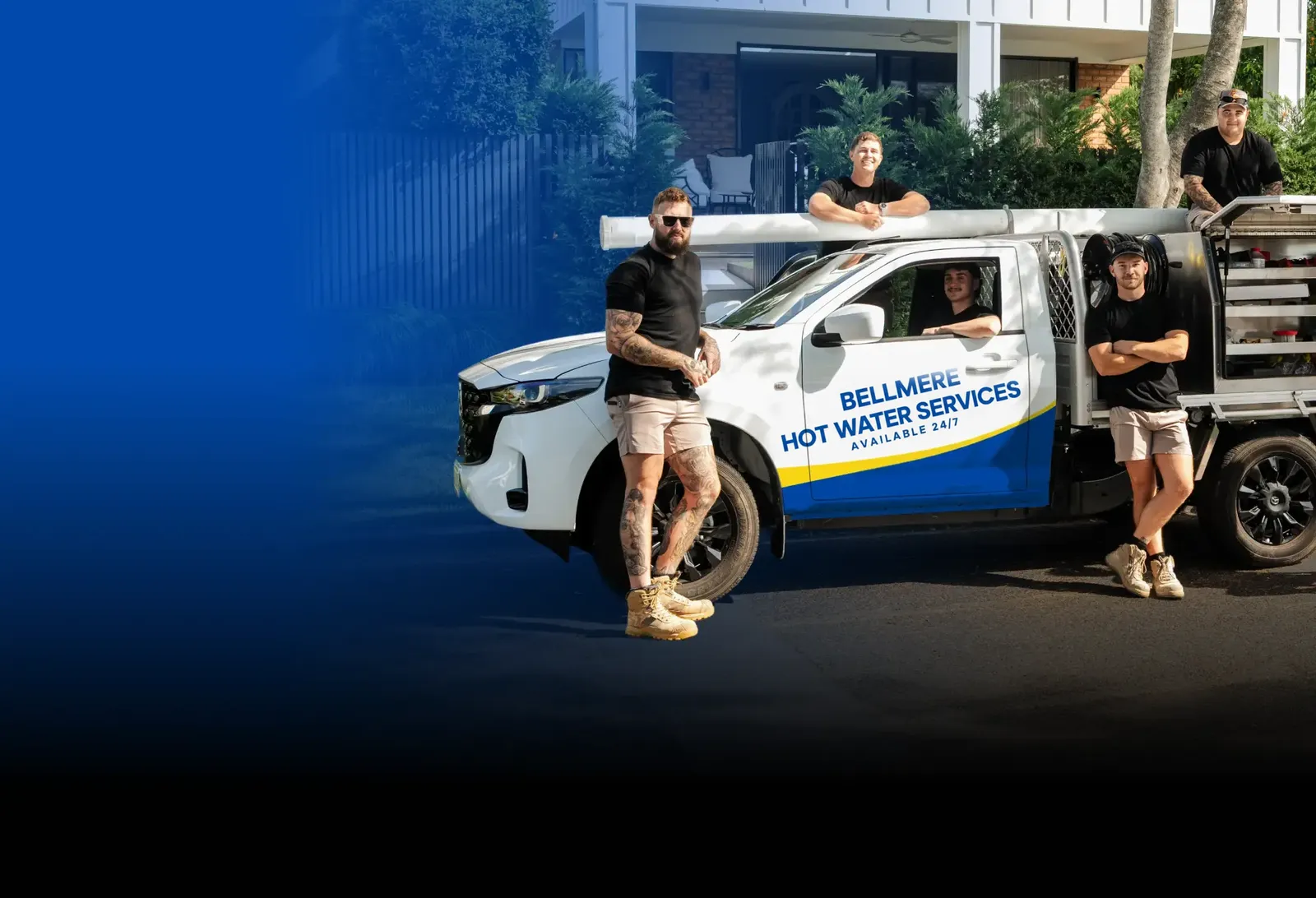Bellmere Hot Water Services team with the ute